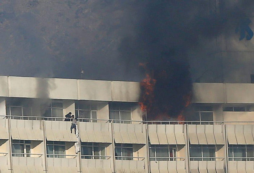 The Intercontinental Hotel is seen during an attack in Kabul, Afghanistan