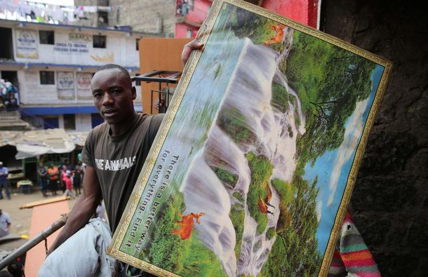 The Wider Image: Tearing down condemned homes in Nairobi