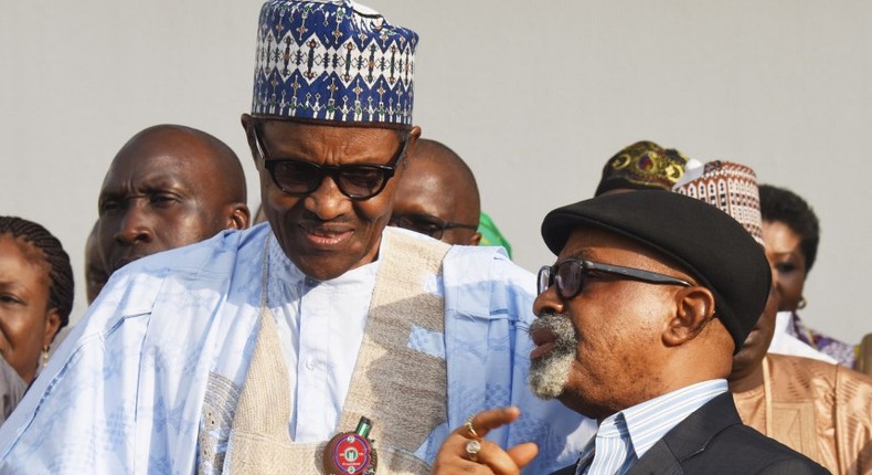 President Muhammadu Buhari (left) with the Minister of Labour, Chris Ngige (right) [Premium Times]