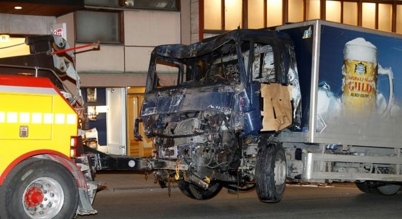 A man has been arrested on suspicion of a terrorist crime through murder, after a stolen truck drove into a crowd outside a department store in Stockholm, killing 4