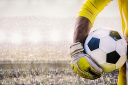 goalkeeper with a soccer ball in the stadium