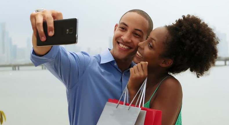 Couple taking a selfie (Courtesy)