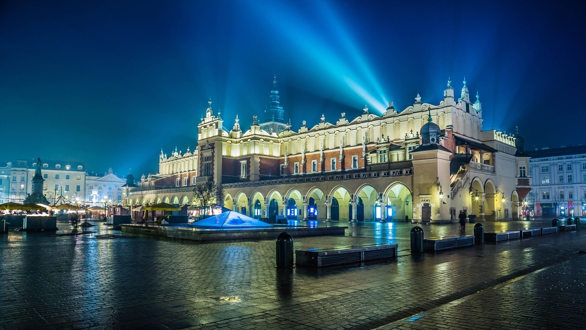 Poland, Krakow. Market Square at night.