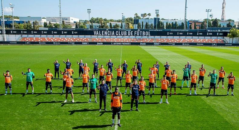 Valencia players lined up behind Mouctar Diakhaby (centre) in a show of support after he alleged he was racially abused