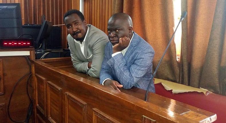 Ssegirinya and Ssewanyana during Court proceedings. Their case has been pushed to 20 February next year following the absence of trial Judge, Alice Komuhangi, today (Photo credit: The Independent Magazine Uganda)