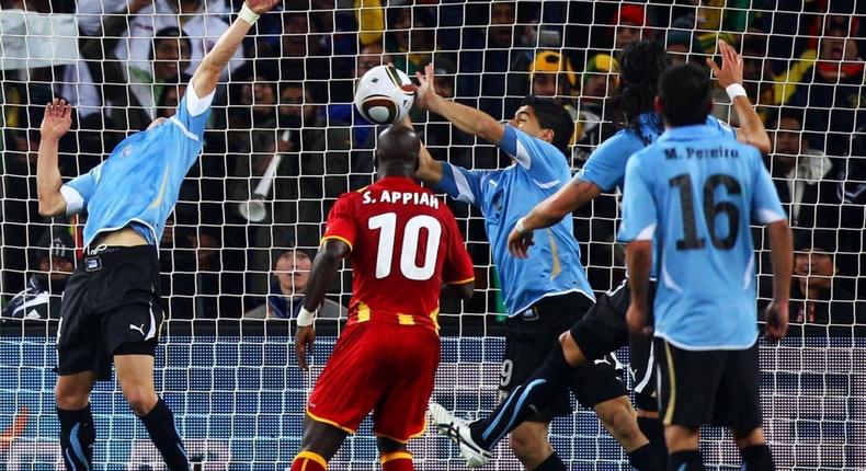 Luis Suarez stops Ghana from scoring at the 2010 FIFA World Cup. 