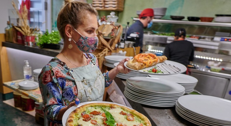 Being a restaurant server is a lot harder than you'd think.Photo by Horacio Villalobos#Corbis/Corbis via Getty Images