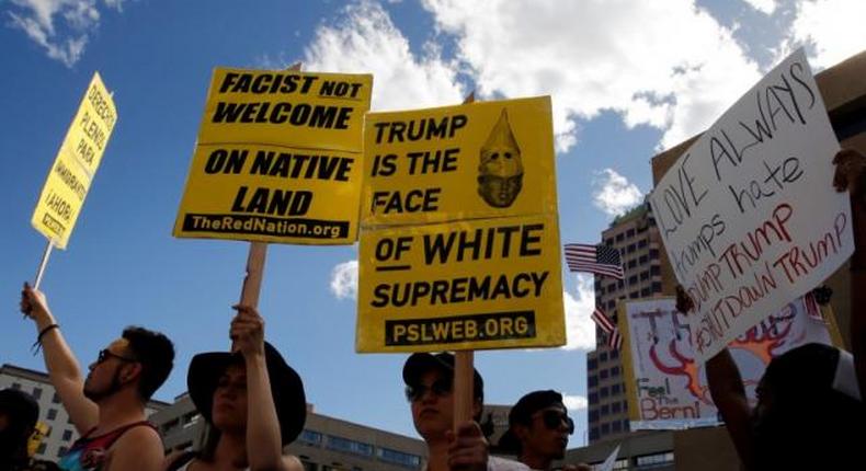 Protesters throw rocks, bottles at police outside Trump rally in New Mexico