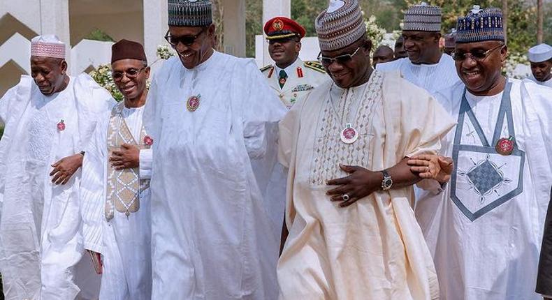Nigeria's President Muhammadu Buhari and state governors take a walk outside the presidential villa (Presidency)