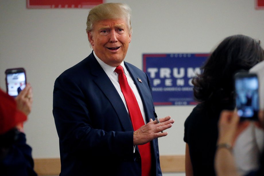 Donald Trump walks into a phone bank before a campaign rally in Greeley, Colorado, U.S. October 30, 2016.