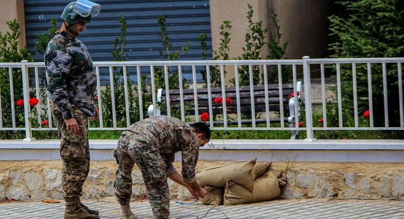 Lebanese army explosives experts work on preparing the site to explode a walkie-talkie that they found thrown away a day after several devices exploded.Photo by Stringer/picture alliance via Getty Images