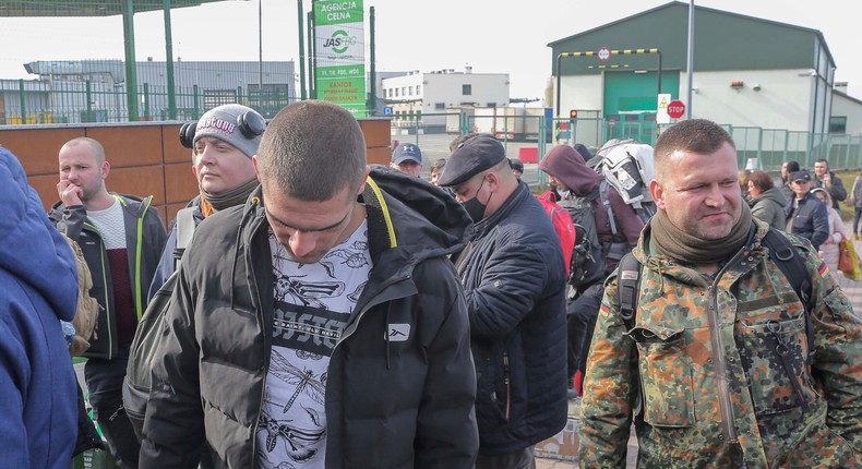 Volunteers waiting to cross the border to go and fight against Russian forces, at Medyka border crossing, in Poland, Saturday, Feb. 26, 2022.