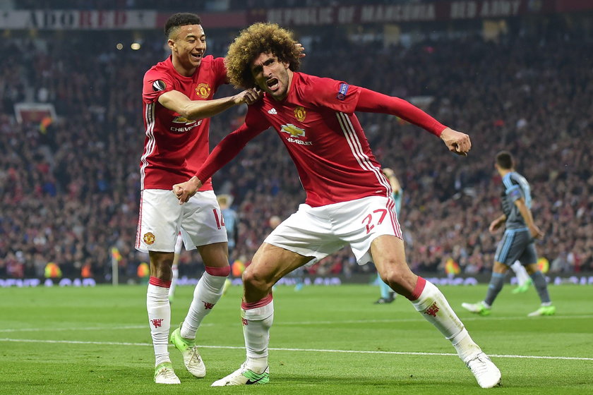 Manchester United's Marouane Fellaini scores their first goal