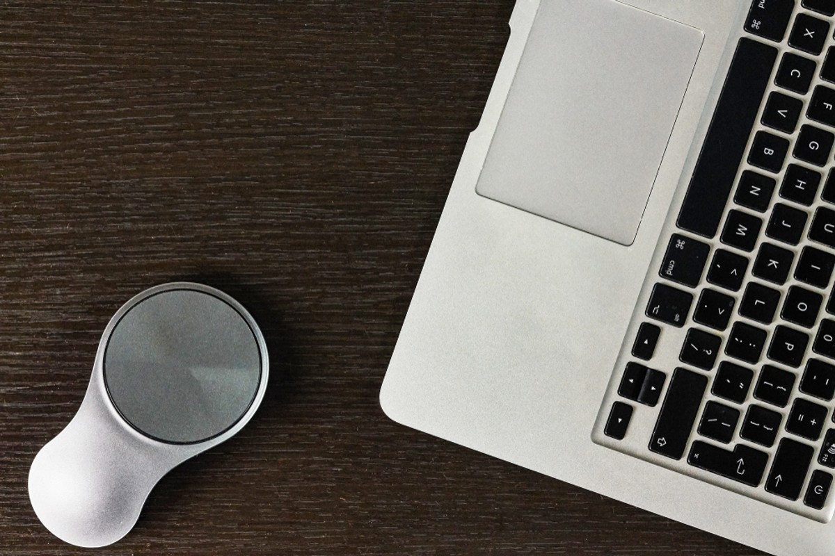 Laptop,And,Stylish,Mouse,On,Table