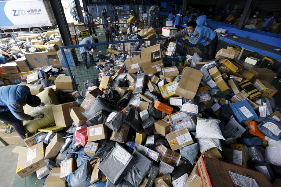 Workers sort packages after Singles' Day in 2015.