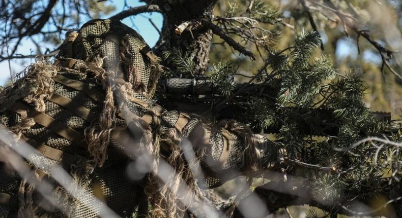 A U.S. Green beret sniper, assigned to 10th Special Forces Group (Airborne), takes aim at a long-range target for a timed shooting event during advanced skills sniper training on Fort Carson, Colorado, Dec. 12, 2018.