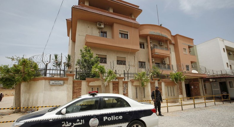 A police vehicle is seen parked in front of the Tunisian consulate in Tripoli, Libya June 13, 2015.  REUTERS/Ismail Zitouny