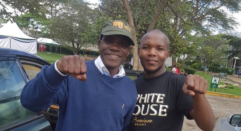 Boni Khalwale with one of his sons