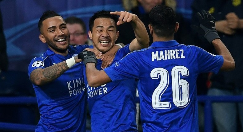 Leicester City's striker Shinji Okazaki (C) celebrates scoring against Club Brugge on November 22, 2016