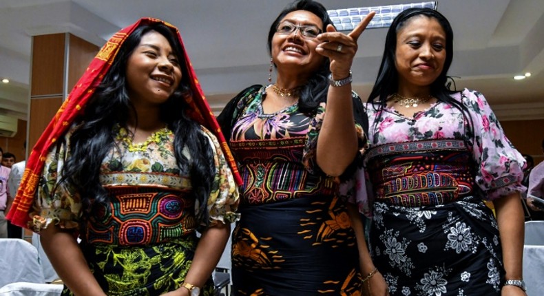 Guna indigenous women from Panama wearing traditional Mola designs at a press conference in Panama City to raise awareness of their intellectual property case against US Sportswear giant Nike