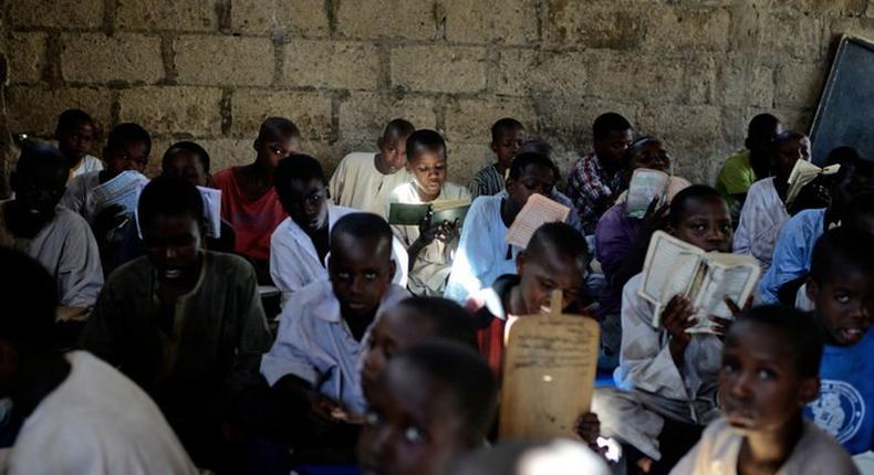 Nigerian children studying the Quran