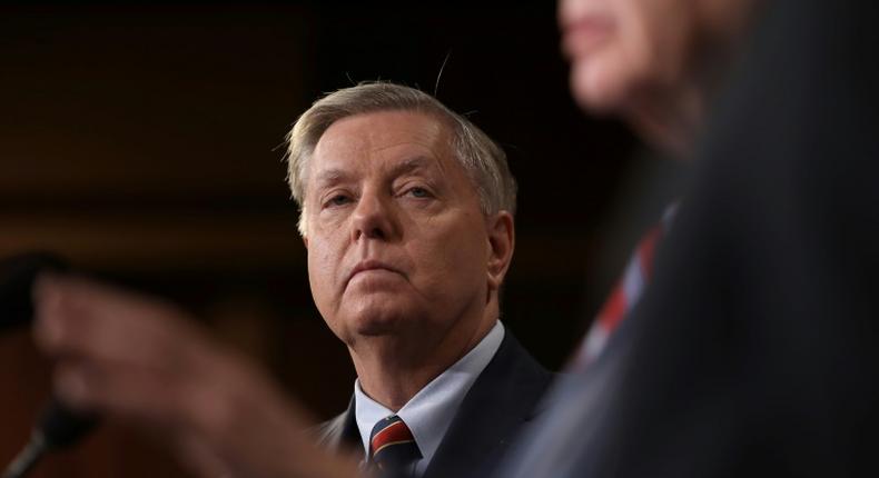 US Senator Lindsey Graham, pictured at a November 2018 news conference at the US Capitol, said he would urge President Donald Trump to 'reconsider' his planned Syria pullout