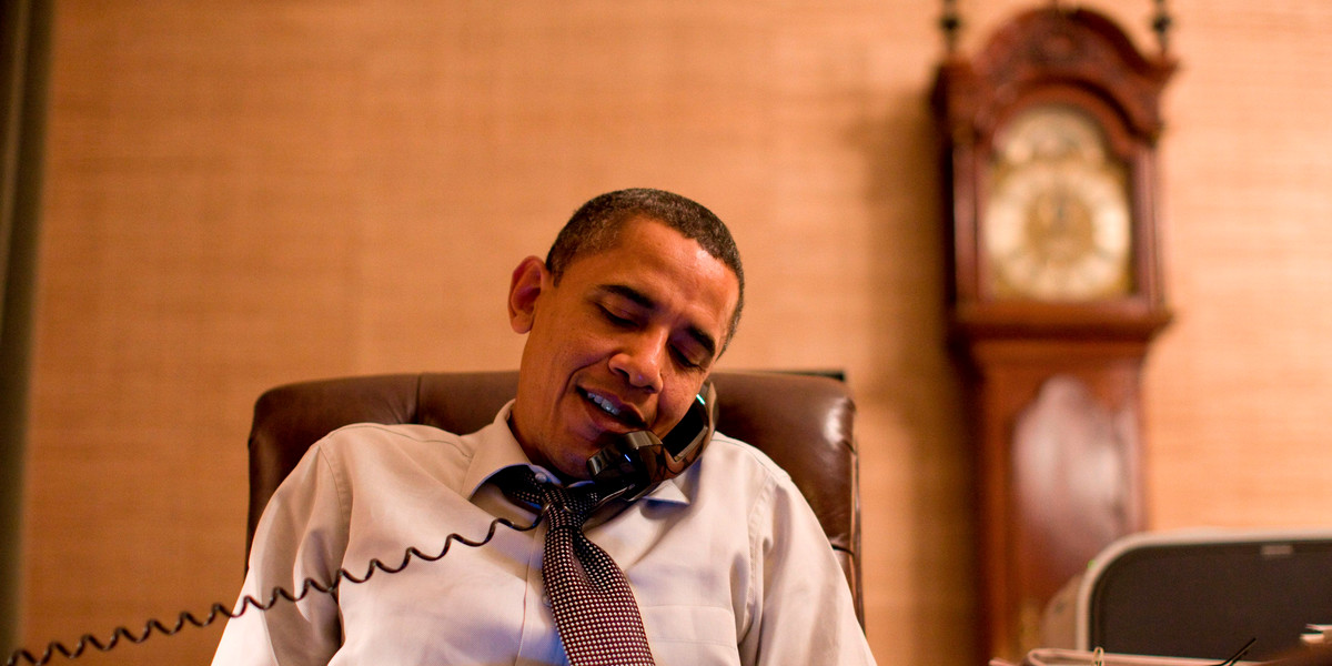US President Barack Obama makes an election-night phone call to Rep. John Boehner (R-Ohio) from his Treaty Room office in the White House residence a couple of minutes after midnight in this November 3, 2010, file photograph.
