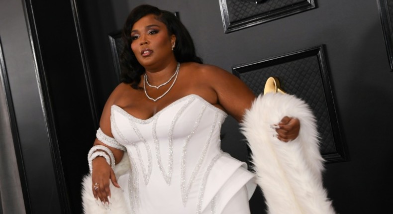 US singer-songwriter Lizzo rocks a Versace corset gown at the Grammys