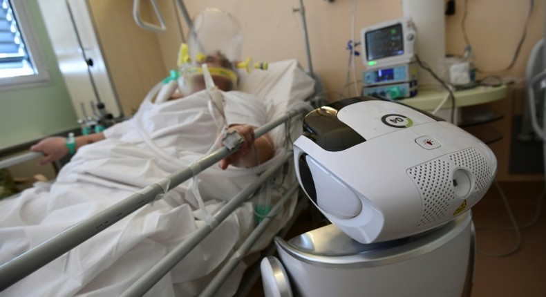 One of the six robots at the Circolo di Varese hospital in northern Italy checks up on a patient in the intensive care unit, helping medical staff reduce the risk of direct contact