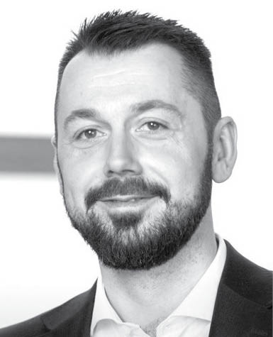 Maciej Guzek doradca podatkowy i partner w Deloitte