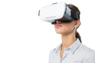 Female executive using virtual reality headset