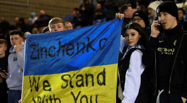 Fans showed support to Ukrainian international Oleksandr Zinchenko, who captained Manchester City against Peterborough Creator: Oli SCARFF
