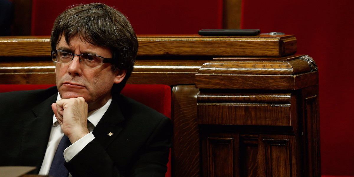 Catalan leader Carles Puigdemont calls for 'democratic opposition' to direct rule