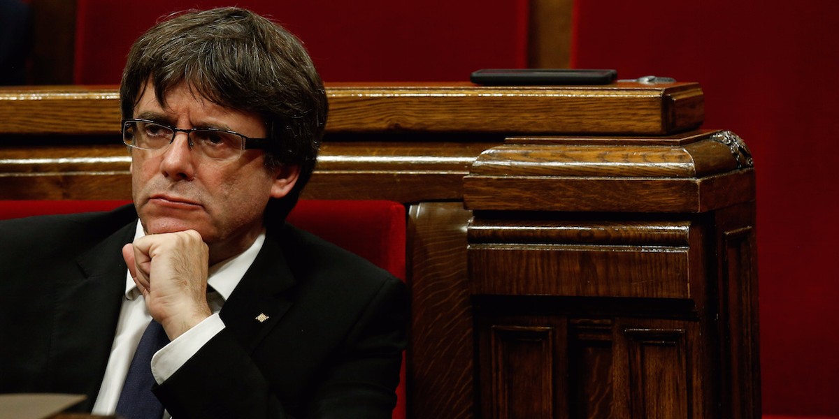 Catalan leader Carles Puigdemont calls for 'democratic opposition' to direct rule