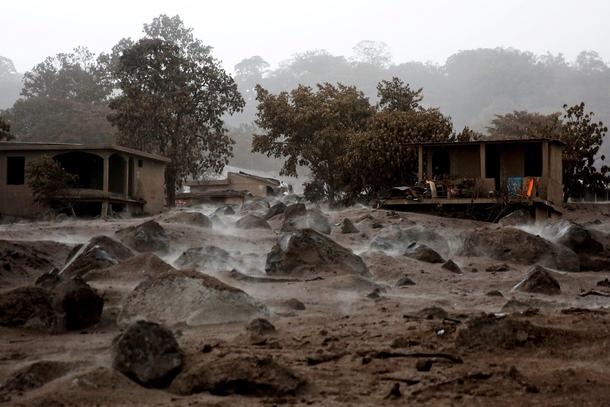 The Wider Image: In volcano's wake, Guatemalan town became a cemetery