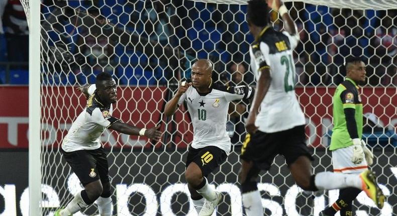Ghana's forward Andre Ayew (C) celebrates with teammates after scoring his team's second goal during the 2017 Africa Cup of Nations quarter-final football match between DR Congo and Ghana in Oyem on January 29, 2017