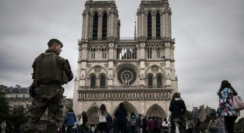 A French soldier stands guard in front of Notre-Dame Cathedral in Paris