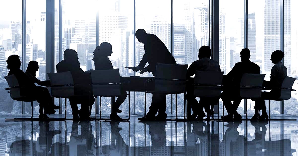 A photo illustration of a boardroom meeting