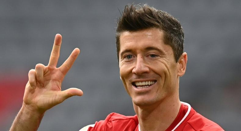 Robert Lewandowski celebrates his hat-trick for Bayern Munich on Saturday