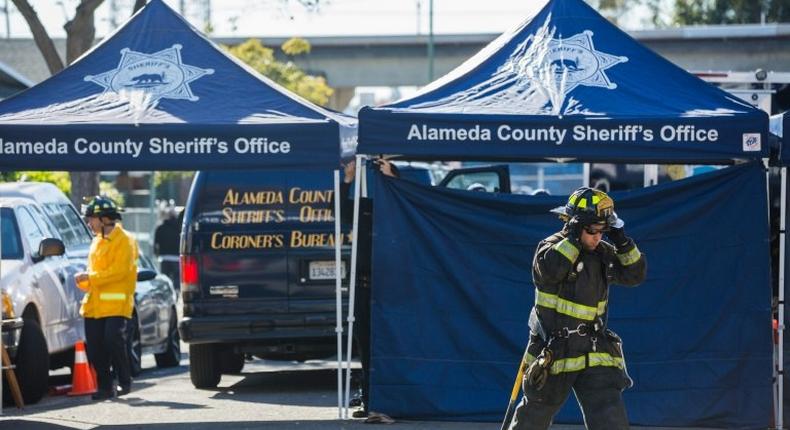 Officials say they expect to recover more human remains from a warehouse in Oakland that went up in flames late Friday, trapping dozens of partygoers attending a rave