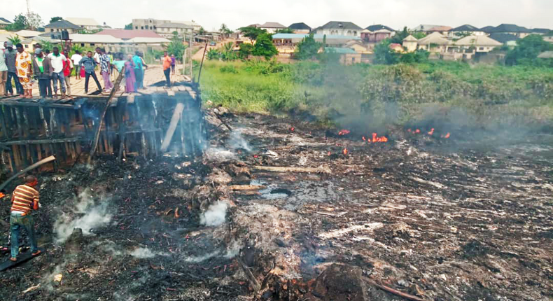 The link bridge between Idowu-Egba and Ayobo area of Lagos has been razed by fire from the pipeline explosion. [Pulse]