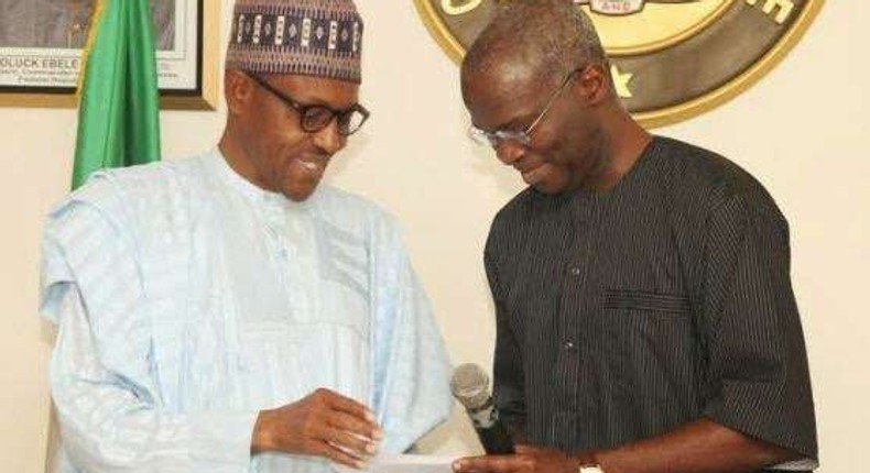 President Muhammadu Buhari (left) and former Lagos State Governor, Babatunde Fashola.