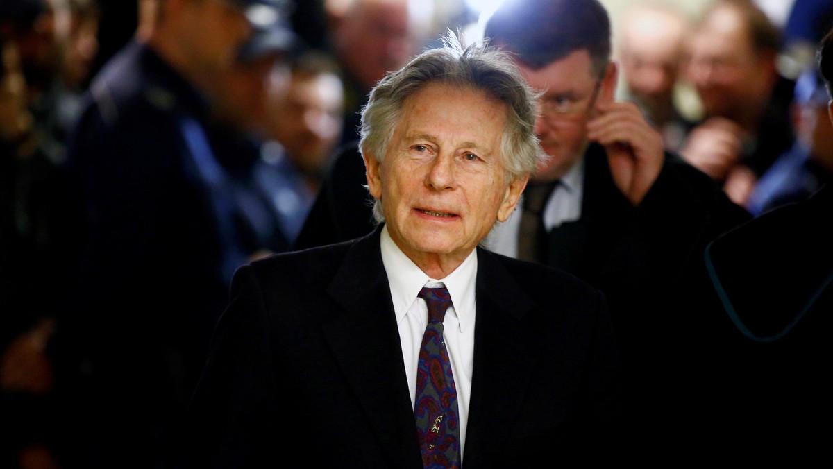 File photo of filmmaker Polanski walking on a corridor during a break of a court hearing in Krakow