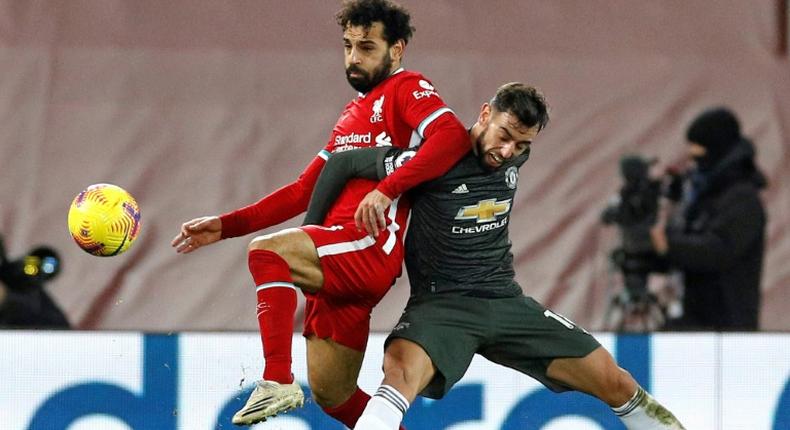 Stalemate: Mohamed Salah (left)and Bruno Fernandes (right)failed to break the deadlock in a 0-0 draw between Liverpool and Manchester United