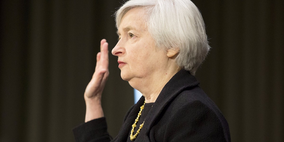 Fed leaves interest rates unchanged, says the economy is solid despite hurricanes