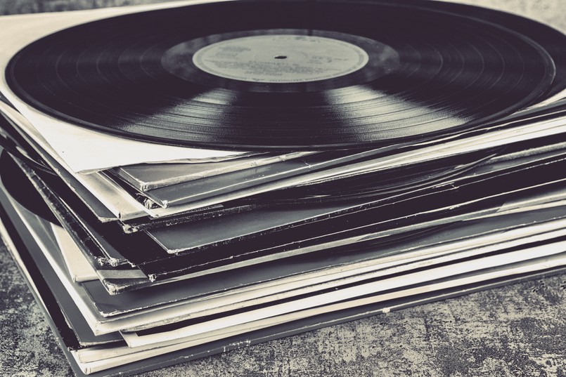 Vintage,Vinyl,Records,On,A,Grunge,Background.,Toned.