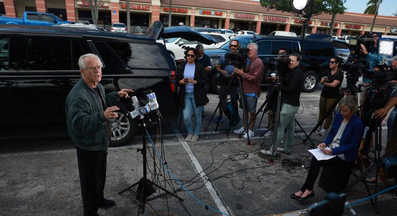Former Trump White House aide Peter Navarro speaks in a strip mall parking lot before reporting to federal prison.Joe Raedle/Getty Images