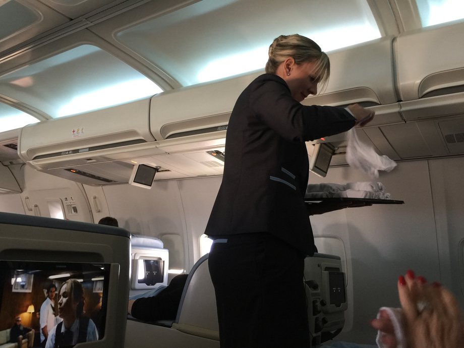 Just after take-off, the flight attendants came around with hot towels.