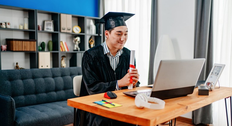 Secretly working two remote jobs helped an Arizona millennial double his income and pay down student loan debt. The worker in the story is not picturedPhynart Studio via Getty Images