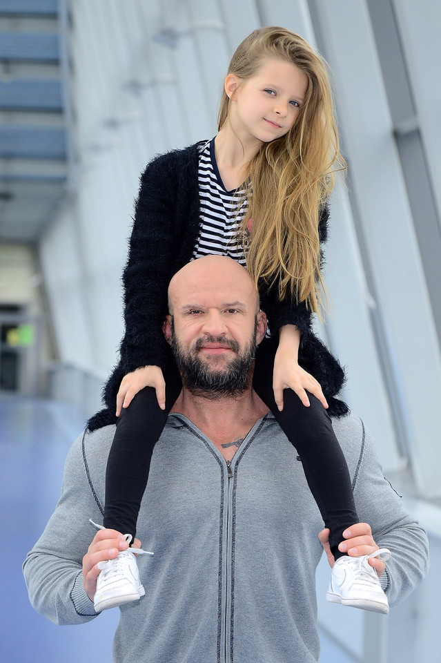 Tomasz Oświeciński z córką Mają
